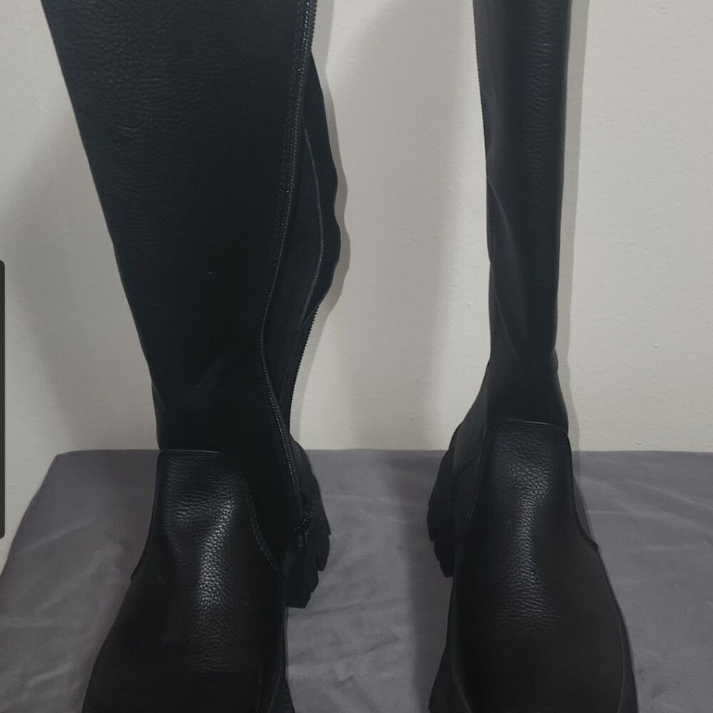 Tall riding boots.